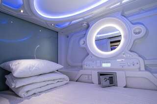 Капсульные отели Capsule Hostels Tallinn Таллин Односпальная кровать в общем номере для мужчин и женщин-12